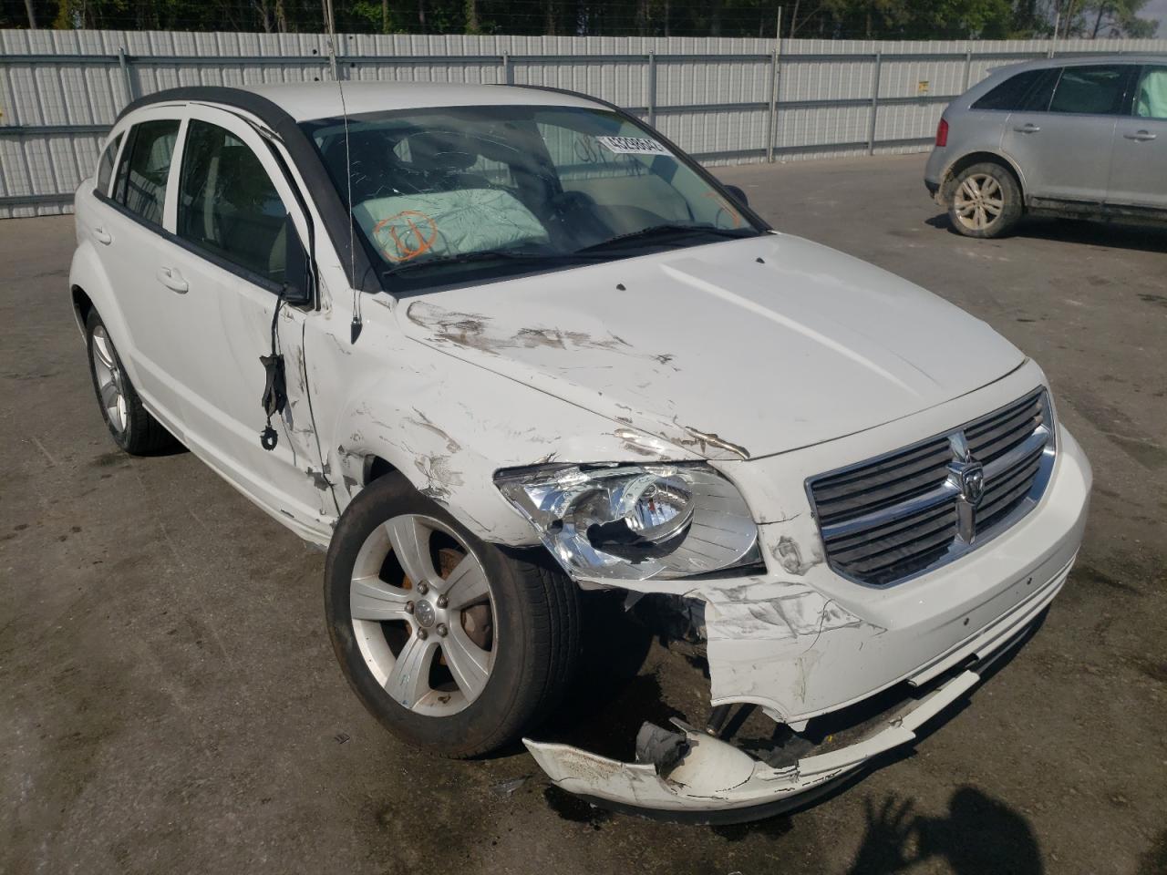 DODGE CALIBER MA 2011 with VIN 1B3CB3HA1BD215020 - Photo from auction