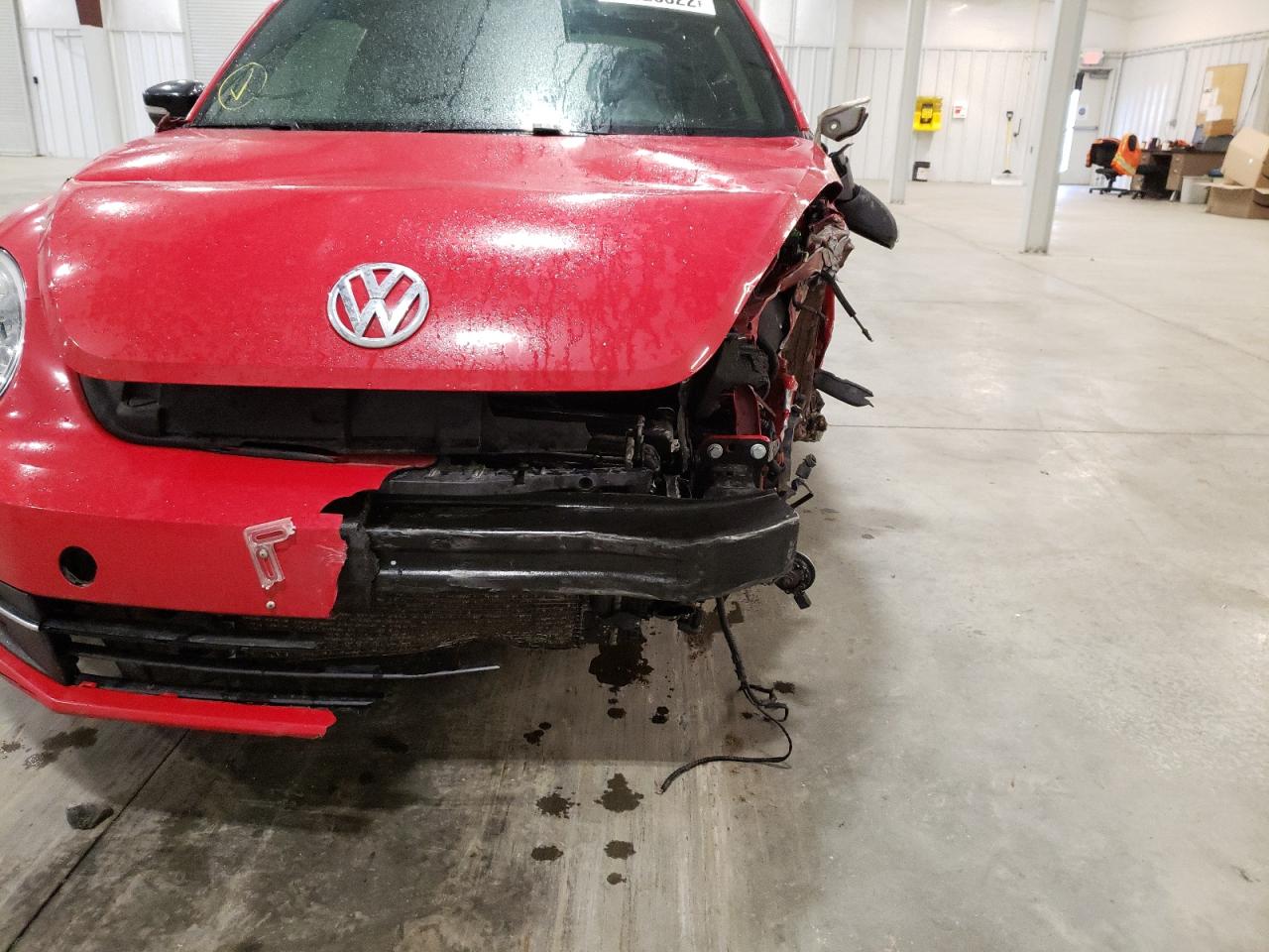 Photo 9 from auction – 2012 VOLKSWAGEN BEETLE TUR with VIN 3VWVA7AT7CM608889