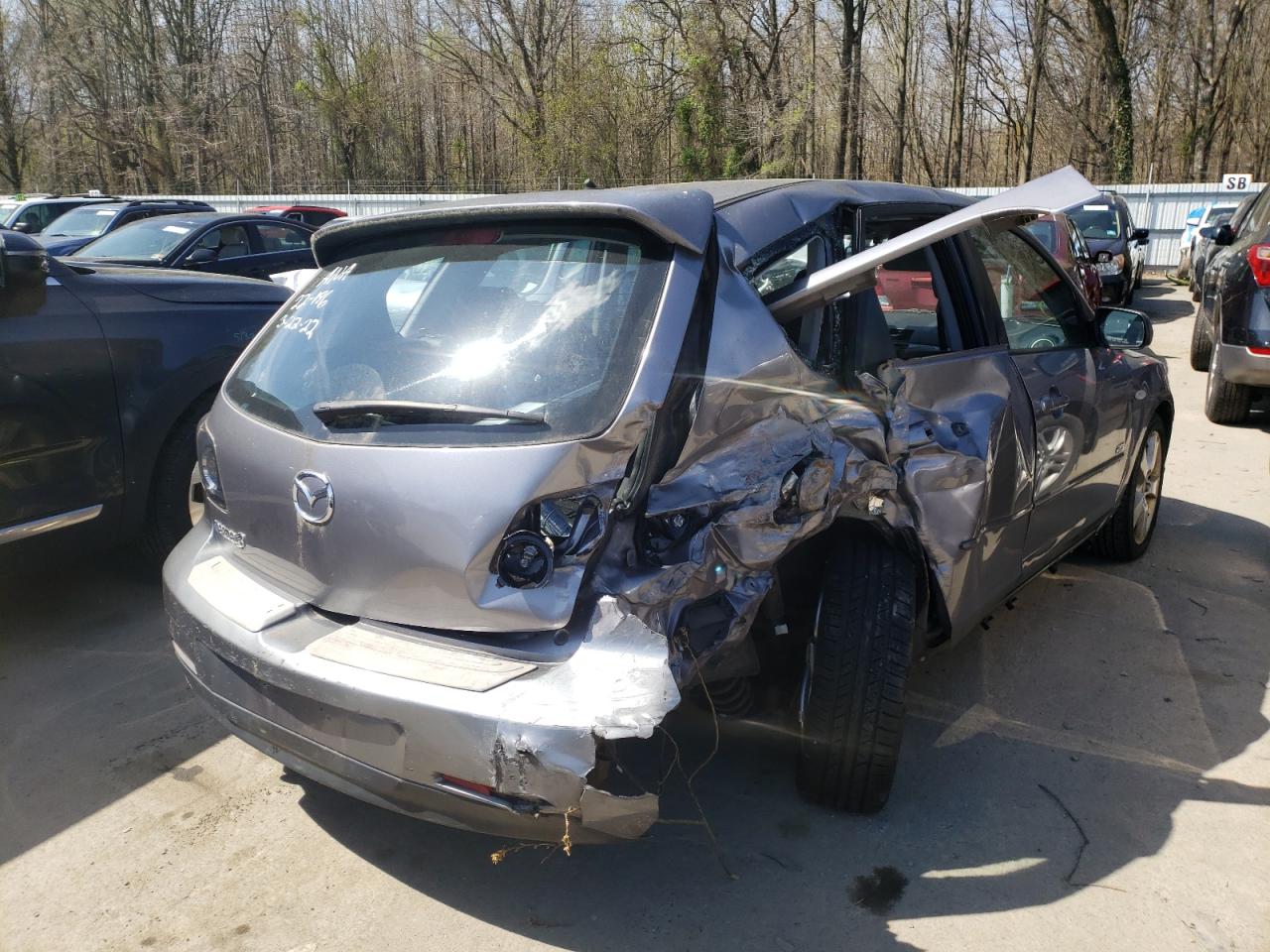 Photo 4 from auction – 2005 MAZDA 3 HATCHBAC with VIN JM1BK343751235750
