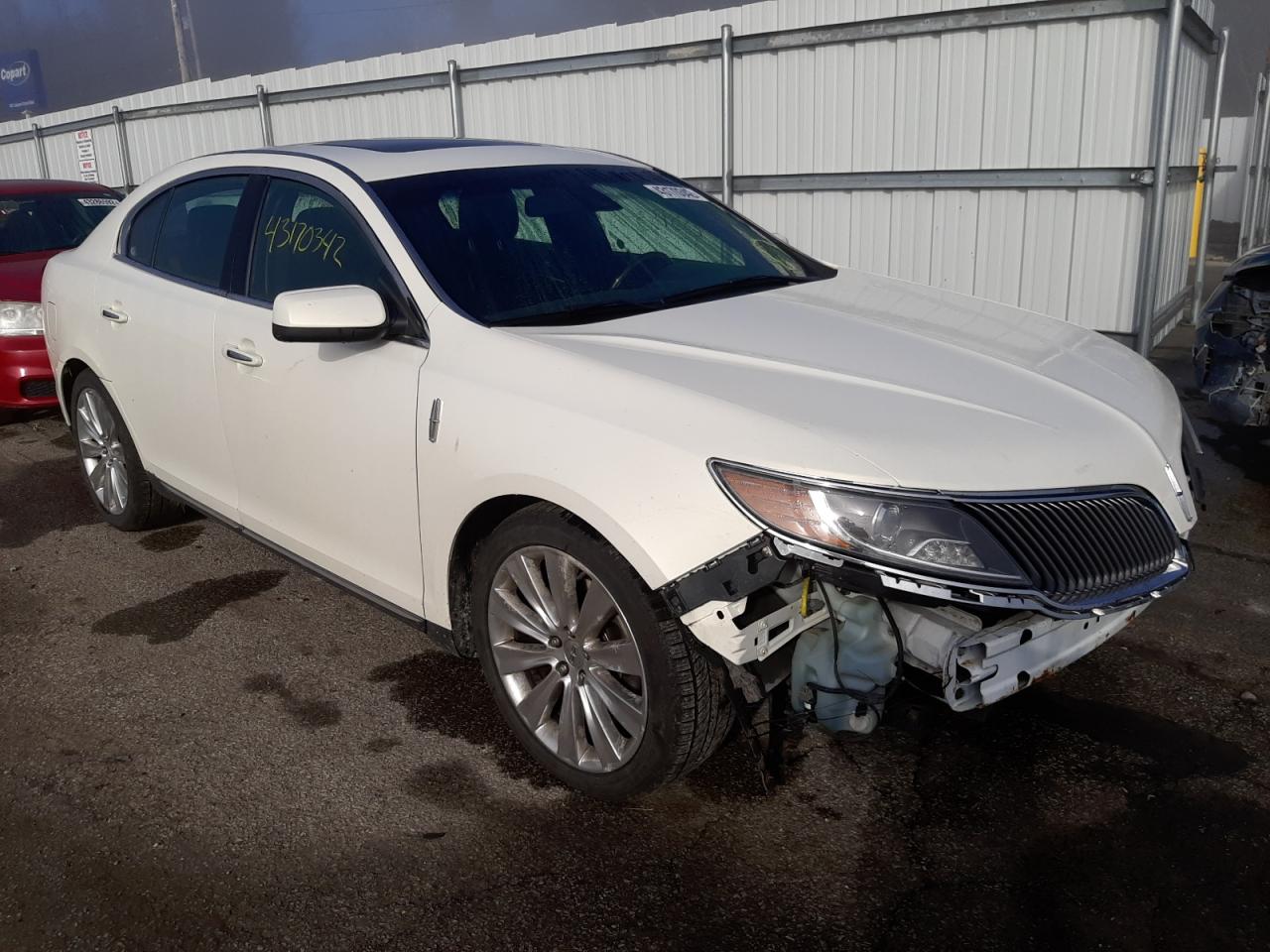 LINCOLN MKS 2013 with VIN 1LNHL9FT8DG606753 - Photo from auction