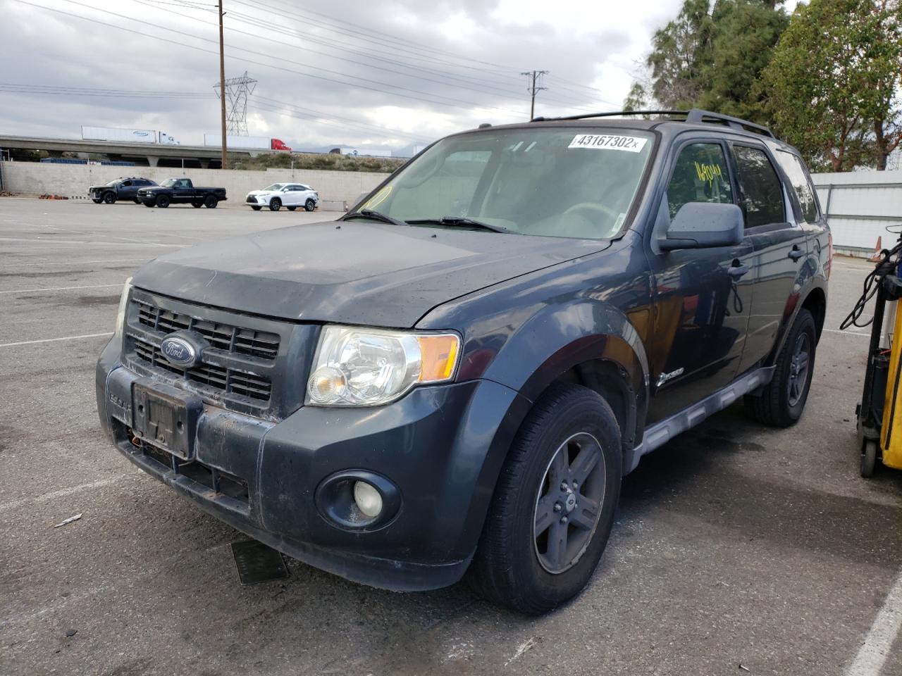 Photo 2 from auction – 2009 FORD ESCAPE with VIN 1FMCU49339KA38521