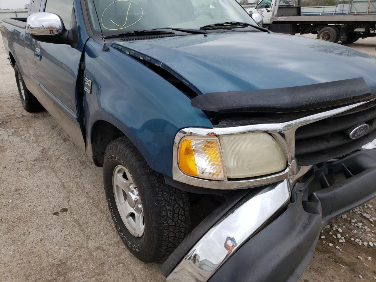 Photo 9 from auction – 2001 FORD F150 with VIN 1FTRX17W31NB08734
