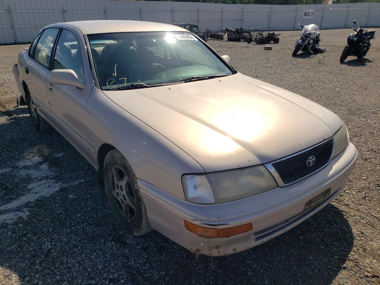 TOYOTA AVALON XL 1997 with VIN 4T1BF12B7VU145933 - Photo from auction