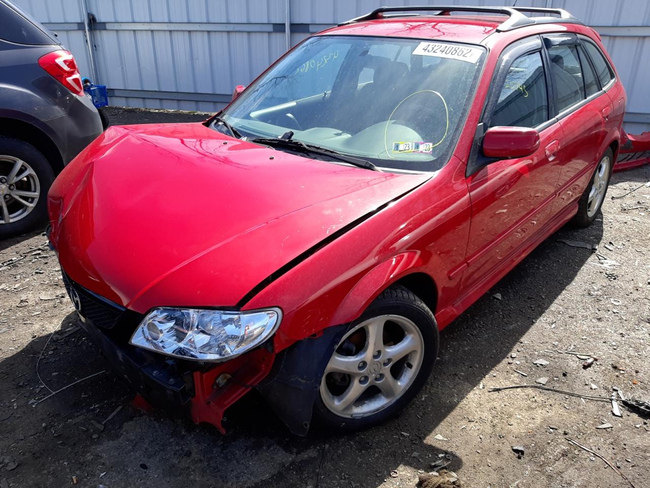 Photo 2 from auction – 2002 MAZDA PROTEGE PR with VIN JM1BJ245X21455023
