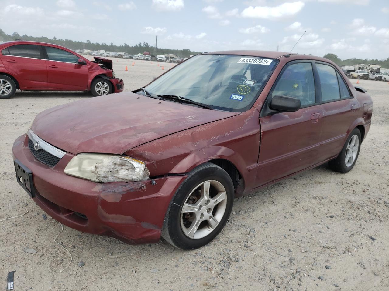 Photo 2 from auction – 1999 MAZDA PROTEGE ES with VIN JM1BJ2220X0118107