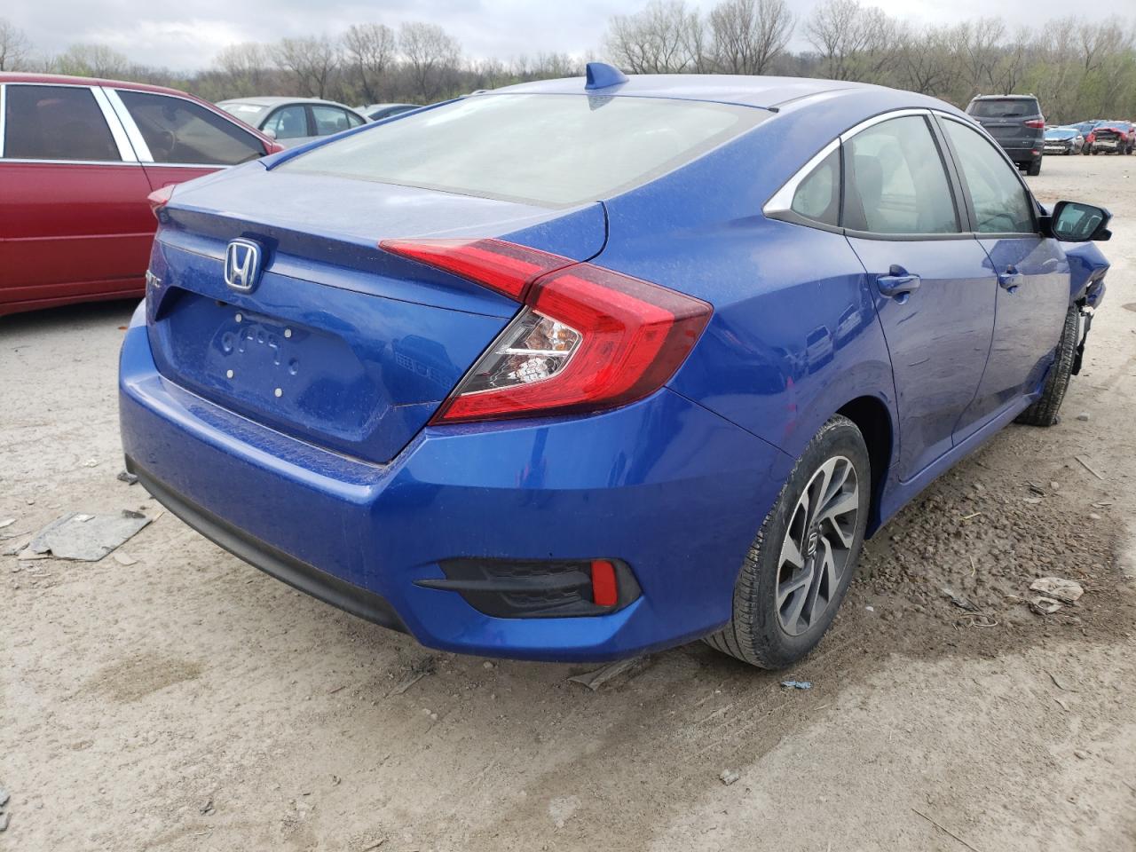 Photo 4 from auction – 2018 HONDA CIVIC EX with VIN 19XFC2F71JE035107