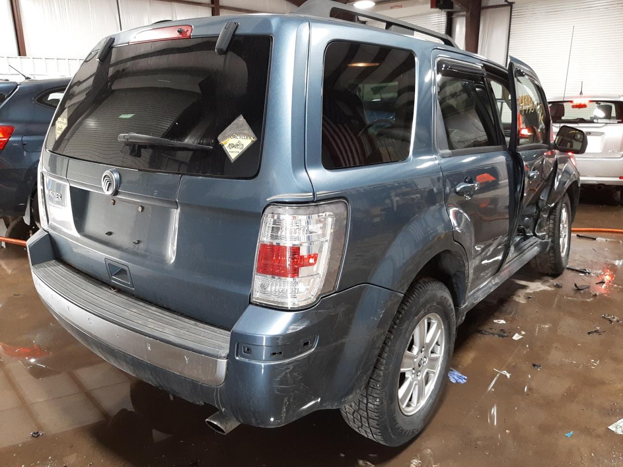Photo 4 from auction – 2010 MERCURY MARINER with VIN 4M2CN9B73AKJ28844