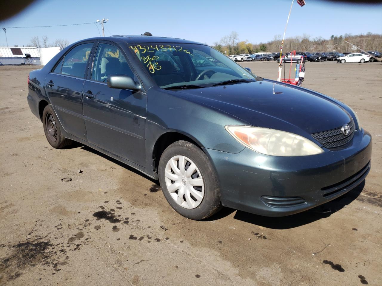 TOYOTA CAMRY LE 2003 with VIN 4T1BE32KX3U760942 - Photo from auction