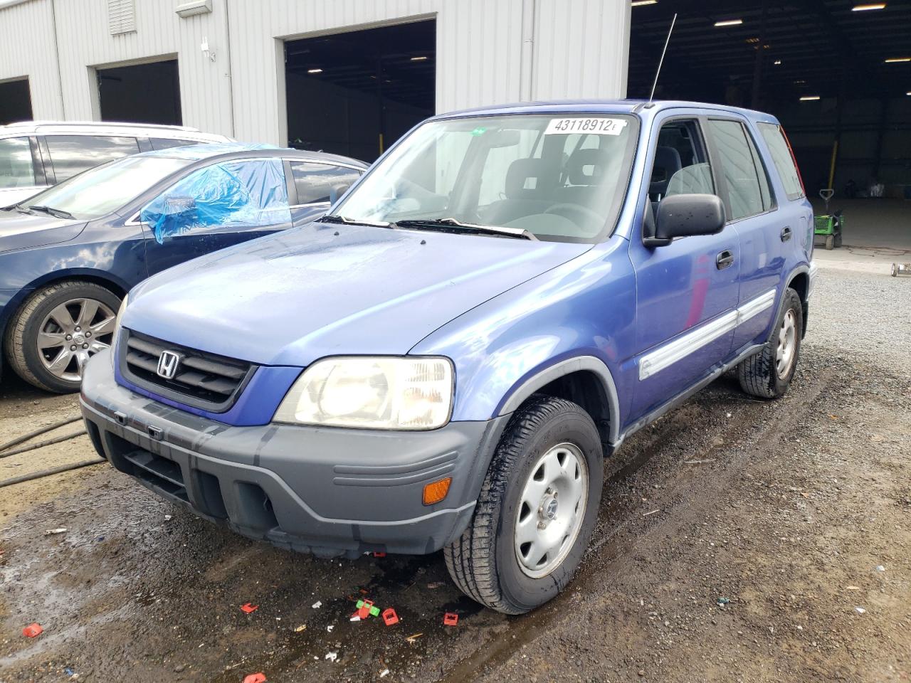 Photo 2 from auction – 2001 HONDA CR-V LX with VIN JHLRD28461C007701