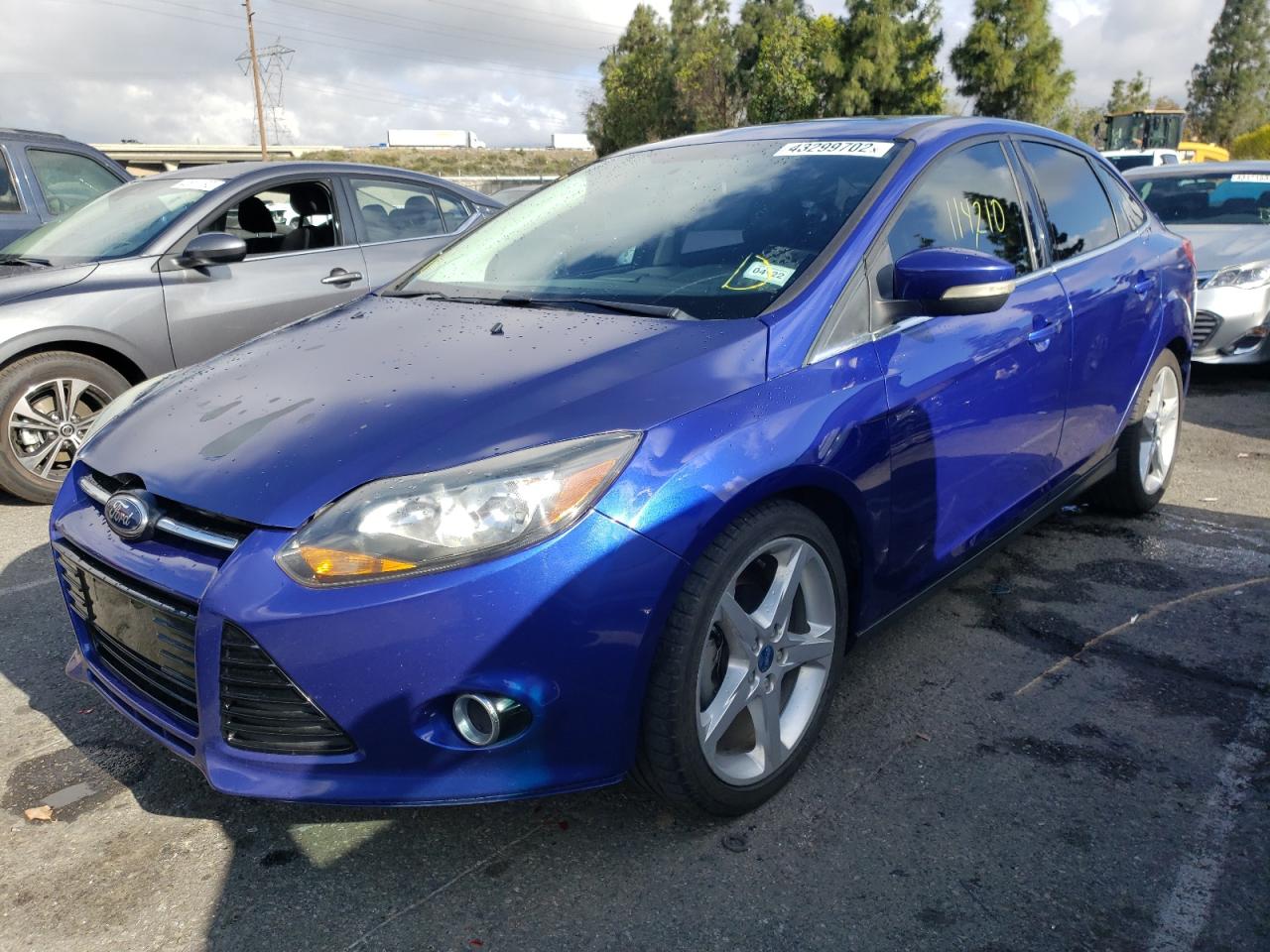 Photo 2 from auction – 2013 FORD FOCUS TITA with VIN 1FADP3J22DL107883