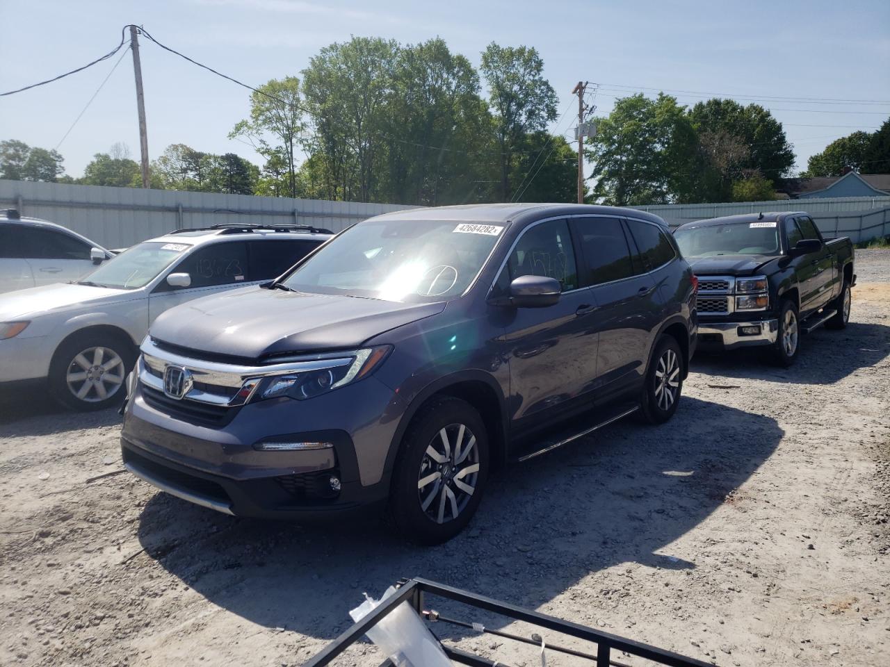 Photo 2 from auction – 2021 HONDA PILOT EXL with VIN 5FNYF6H58MB083754