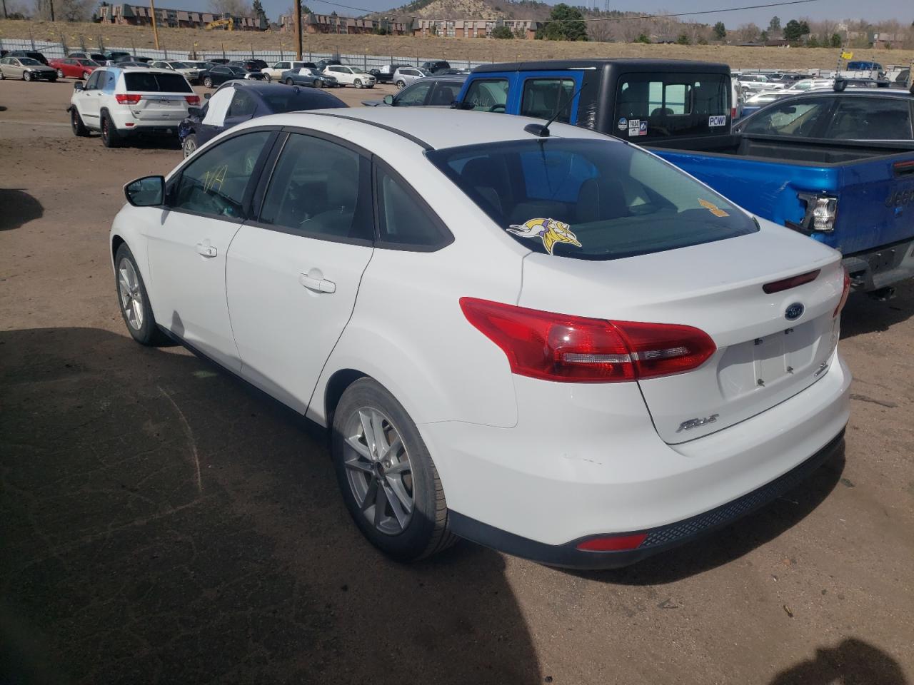 Photo 3 from auction – 2016 FORD FOCUS SE with VIN 1FADP3F21GL336620