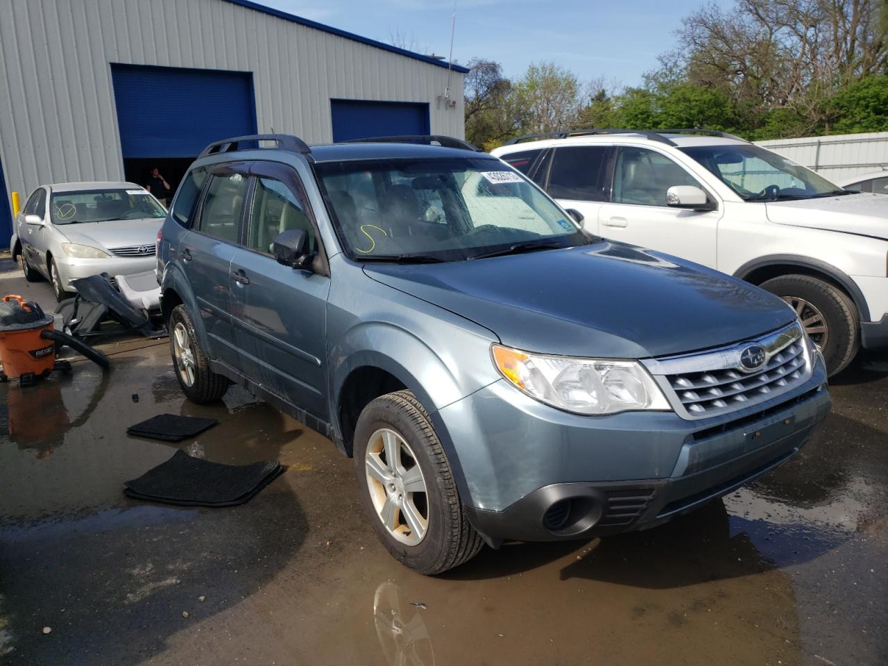 SUBARU FORESTER 2 2013 with VIN JF2SHABC1DH431860 - Photo from auction