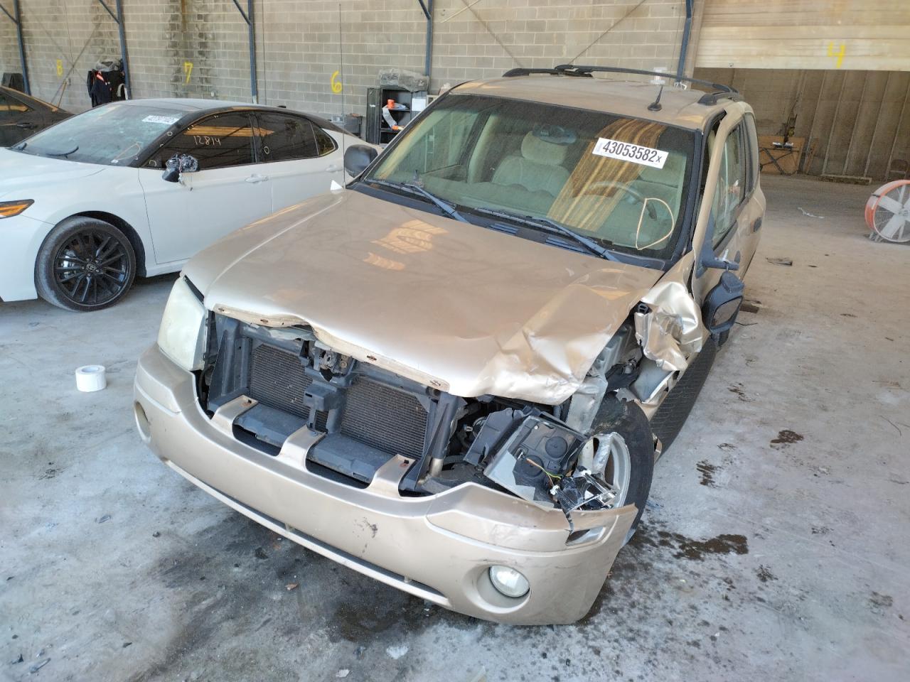 Photo 9 from auction – 2004 GMC ENVOY with VIN 1GKDS13S742368009