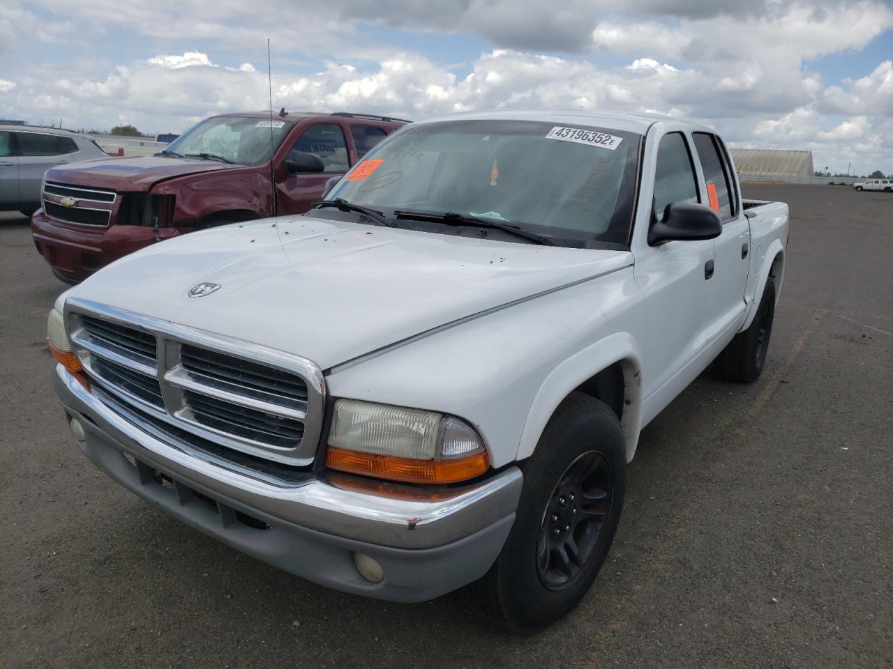 Photo 2 from auction – 2004 DODGE DAKOTA QUA with VIN 1D7HL48N14S717072