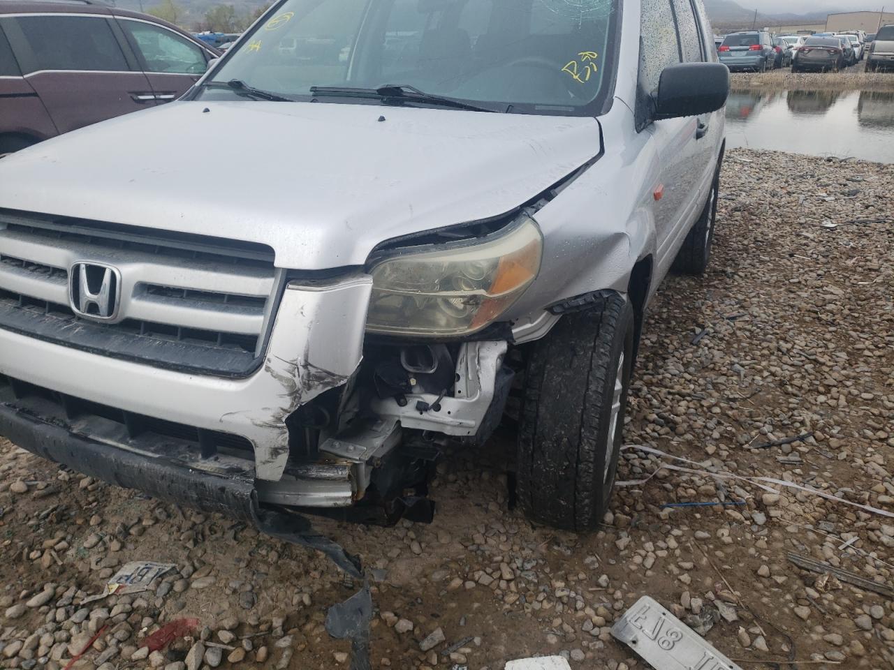 Photo 9 from auction – 2006 HONDA PILOT LX with VIN 2HKYF18156H520890