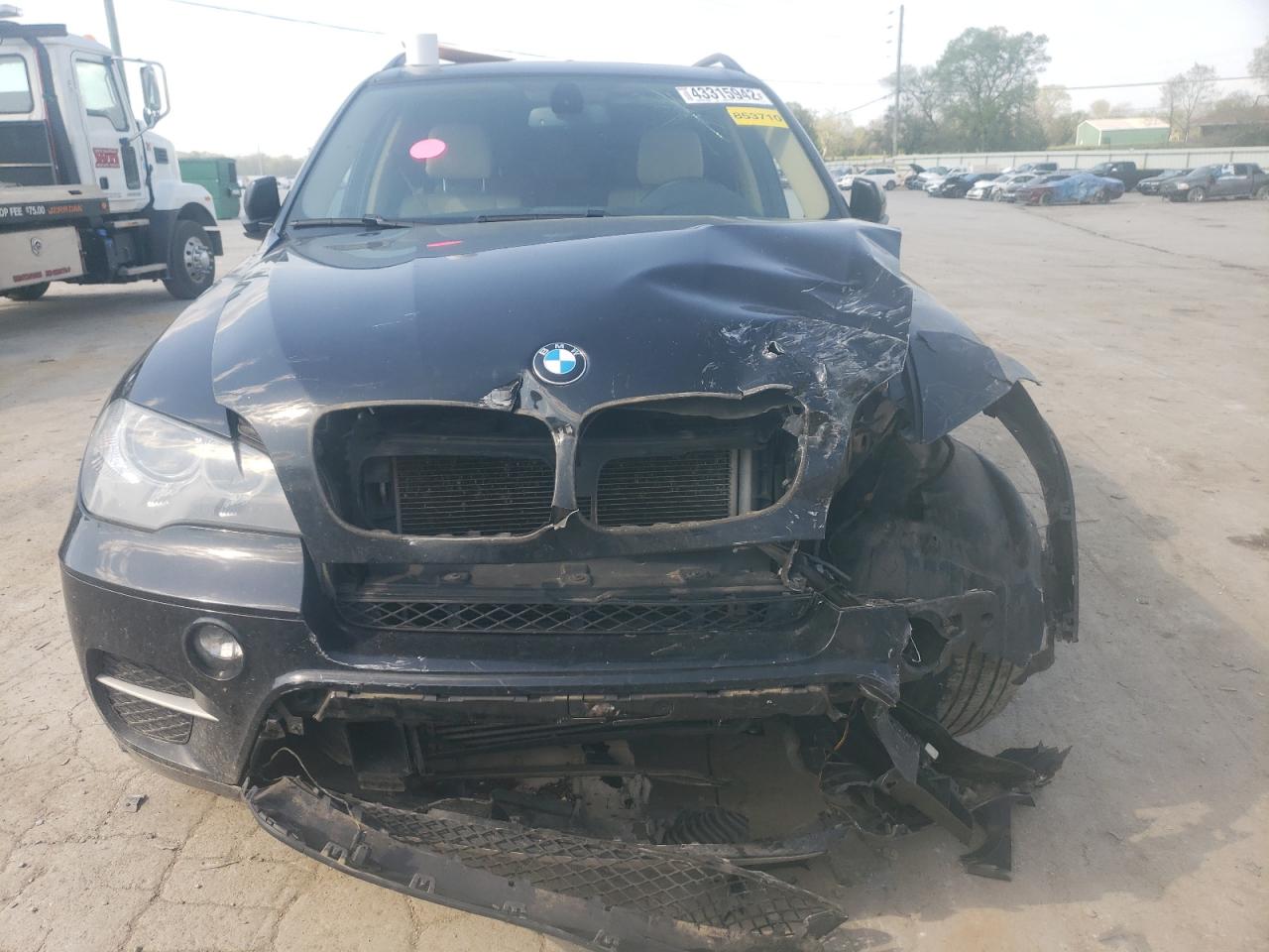 Photo 9 from auction – 2012 BMW X5 XDRIVE3 with VIN 5UXZV4C5XCL992303
