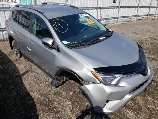 TOYOTA RAV4 LE 2018 with VIN 2T3BFREV6JW767834 - Photo from auction