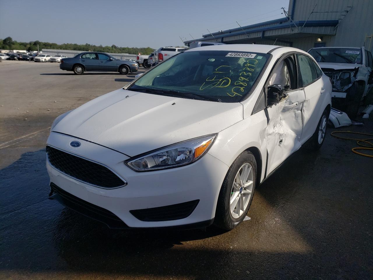 Photo 2 from auction – 2017 FORD FOCUS SE with VIN 1FADP3F26HL322634
