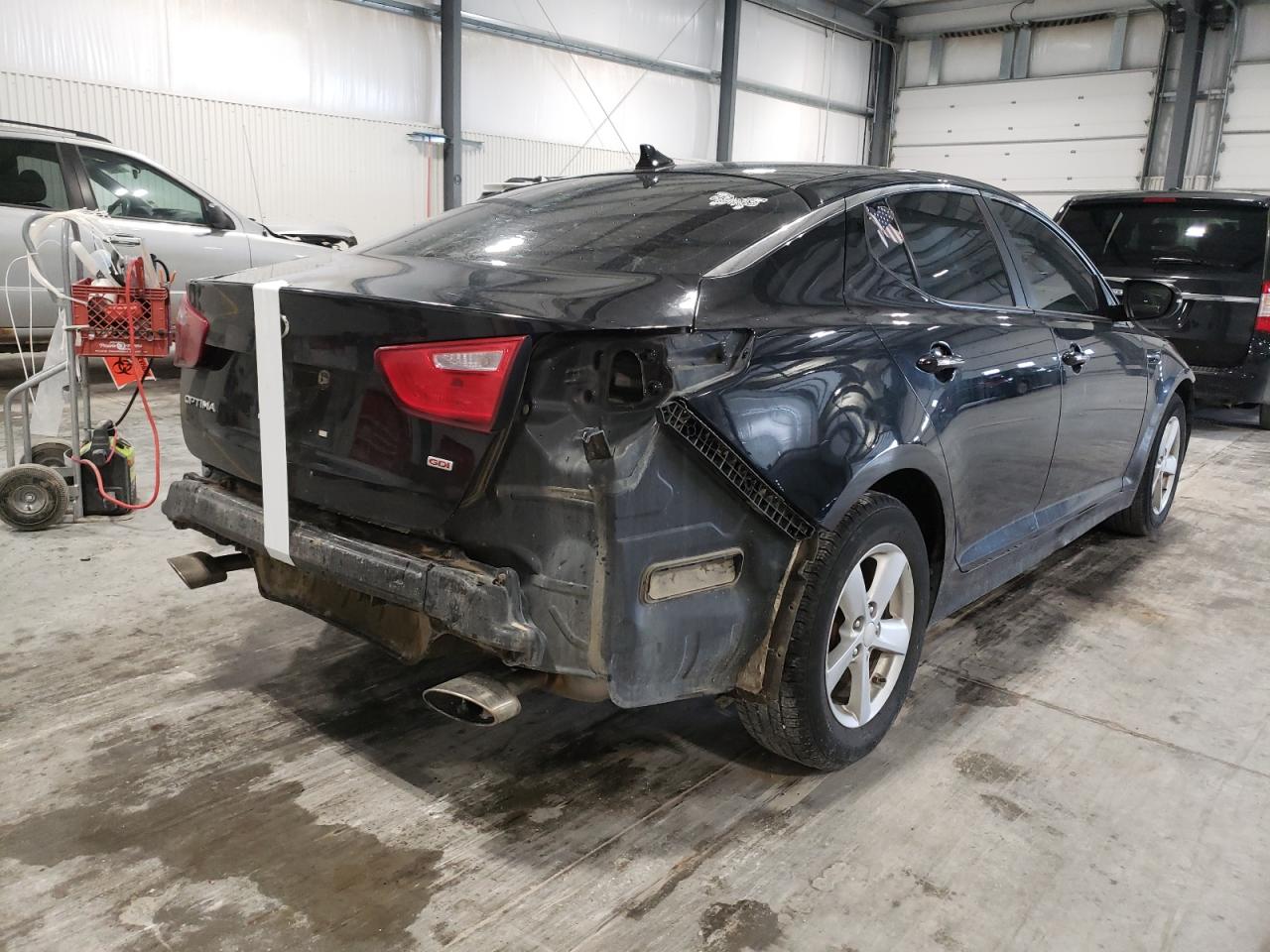 Photo 4 from auction – 2015 KIA OPTIMA LX with VIN 5XXGM4A79FG352295