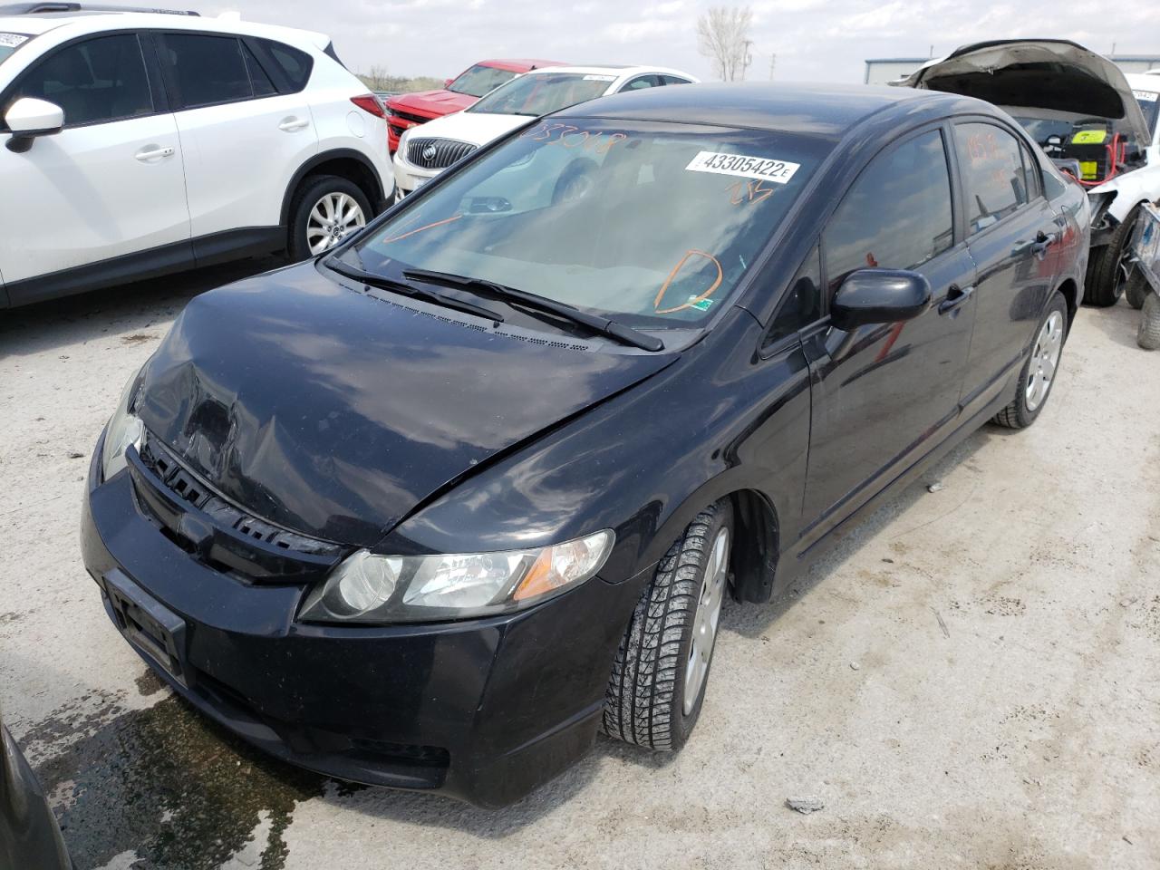 Photo 2 from auction – 2011 HONDA CIVIC LX with VIN 19XFA1F57BE033068