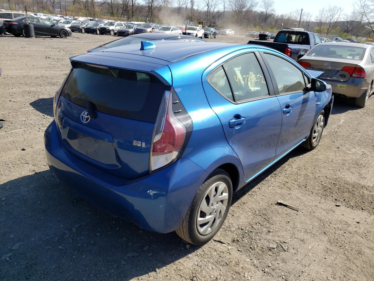 Photo 4 from auction – 2015 TOYOTA PRIUS C with VIN JTDKDTB39F1582169