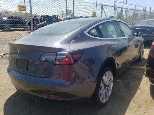 Photo 4 from auction – 2019 TESLA MODEL 3 with VIN 5YJ3E1EA4KF519840