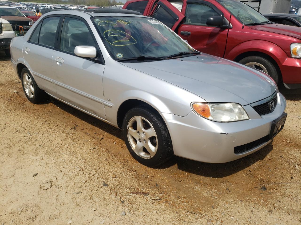 MAZDA PROTEGE DX 2002 with VIN JM1BJ225621574724 - Photo from auction