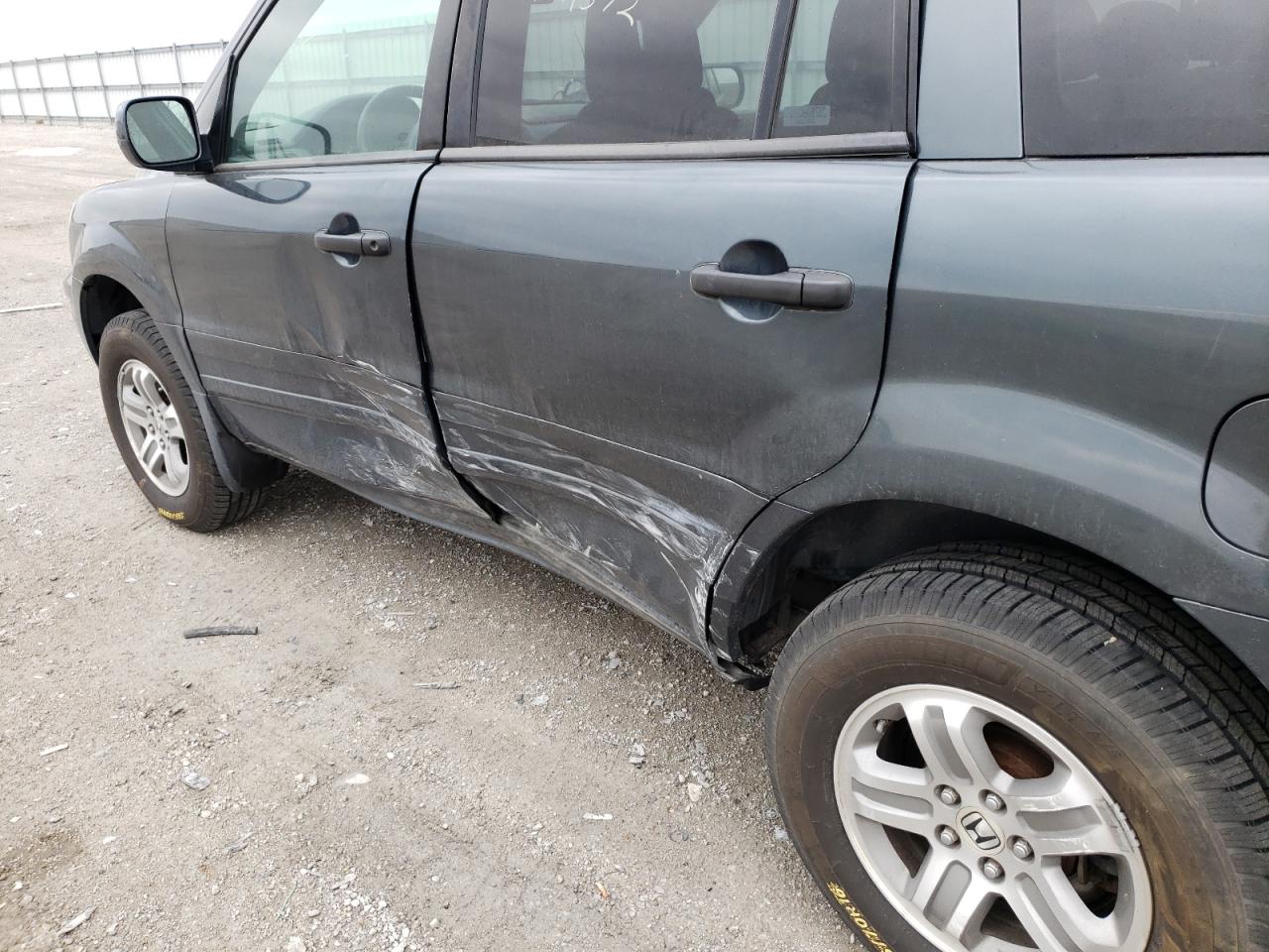 Photo 10 from auction – 2005 HONDA PILOT EX with VIN 2HKYF184X5H570600