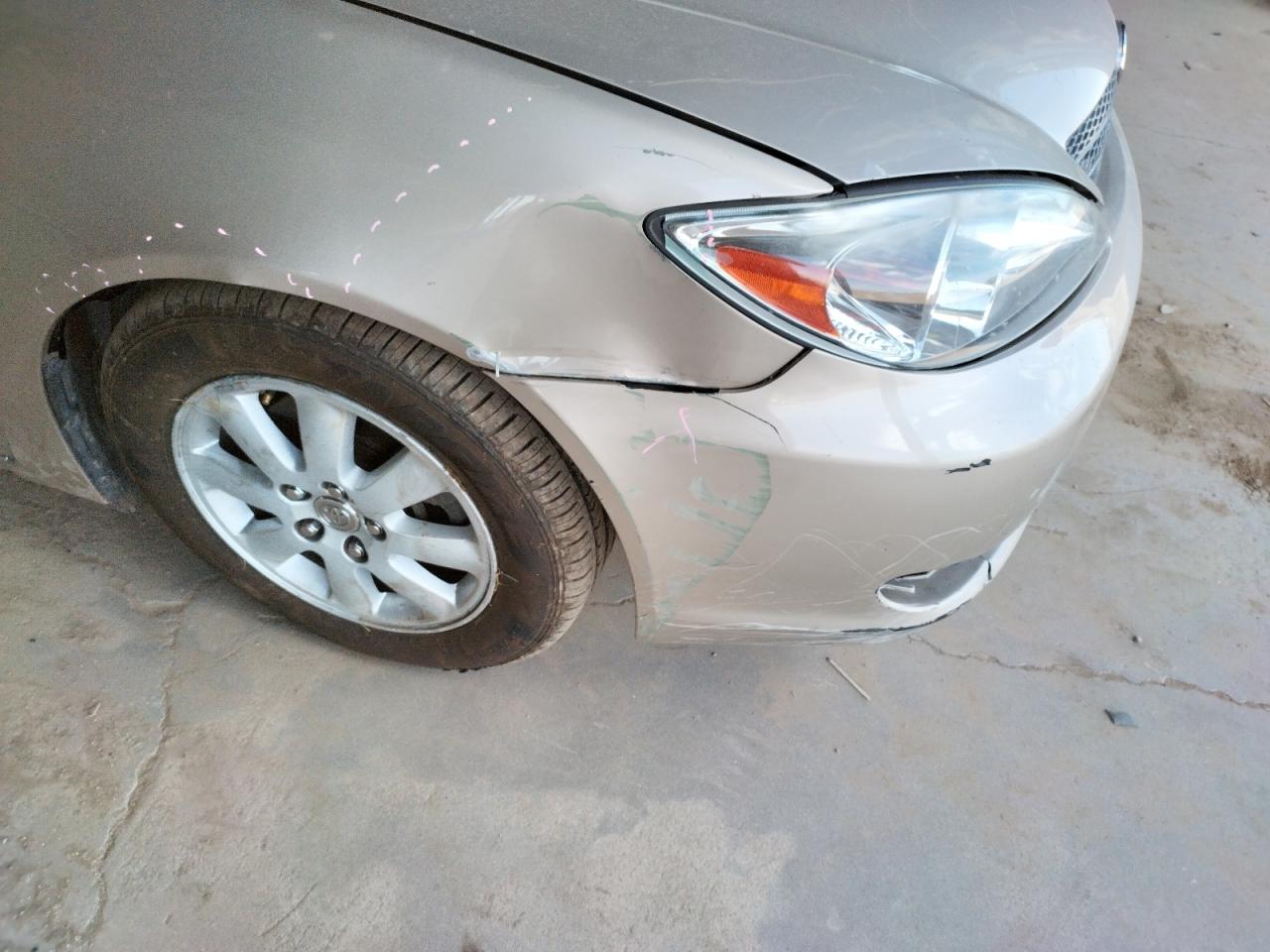 Photo 9 from auction – 2004 TOYOTA CAMRY LE with VIN 4T1BF30K44U074171