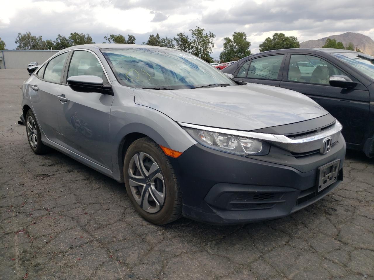 HONDA CIVIC LX 2017 with VIN 2HGFC2F51HH515940 - Photo from auction