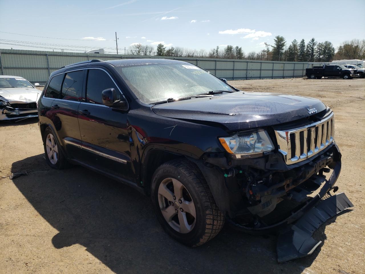 JEEP GRAND CHER 2011 with VIN 1J4RR4GT4BC516717 - Photo from auction