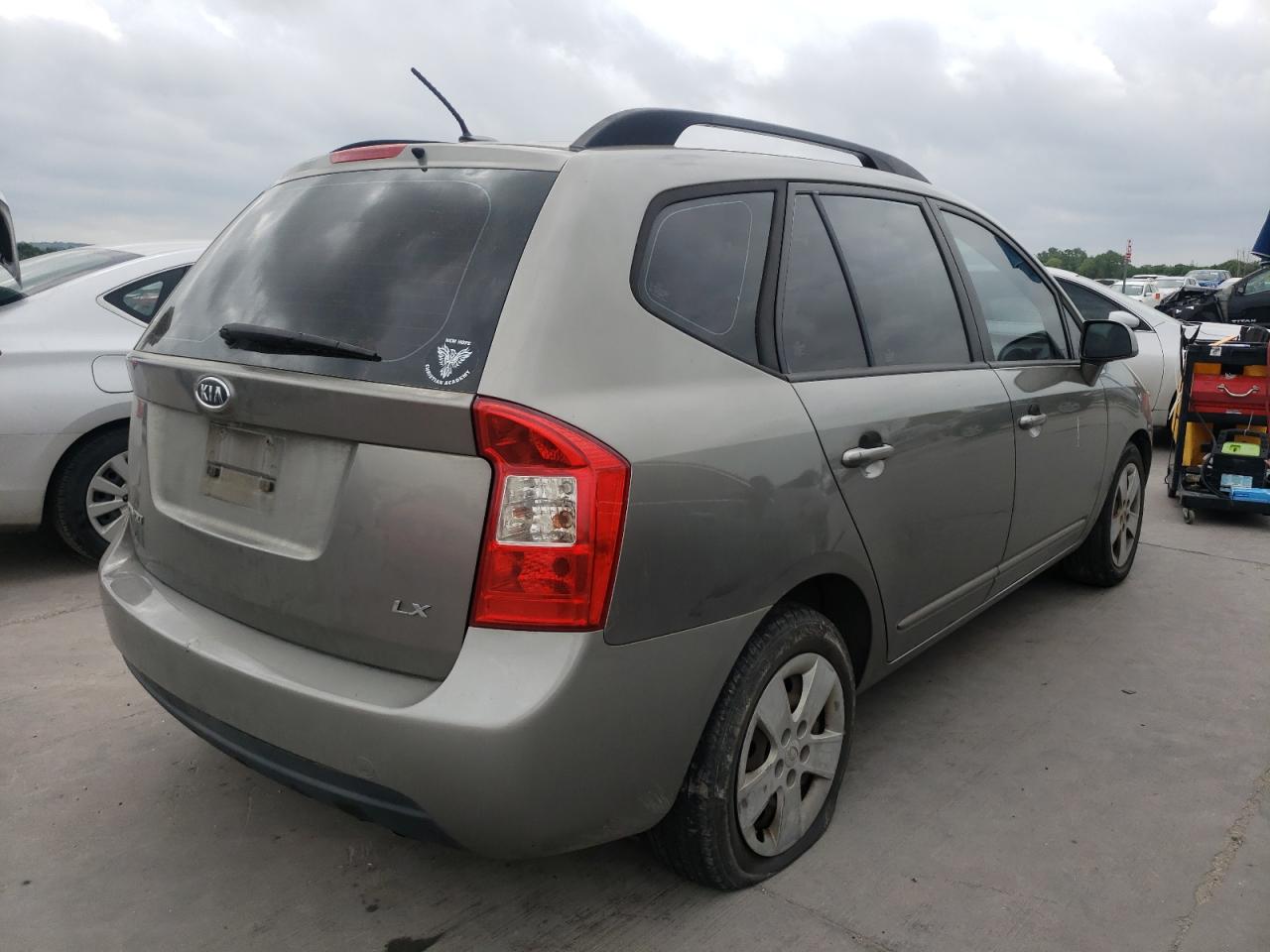 Photo 4 from auction – 2009 KIA RONDO BASE with VIN KNAFG528097225185