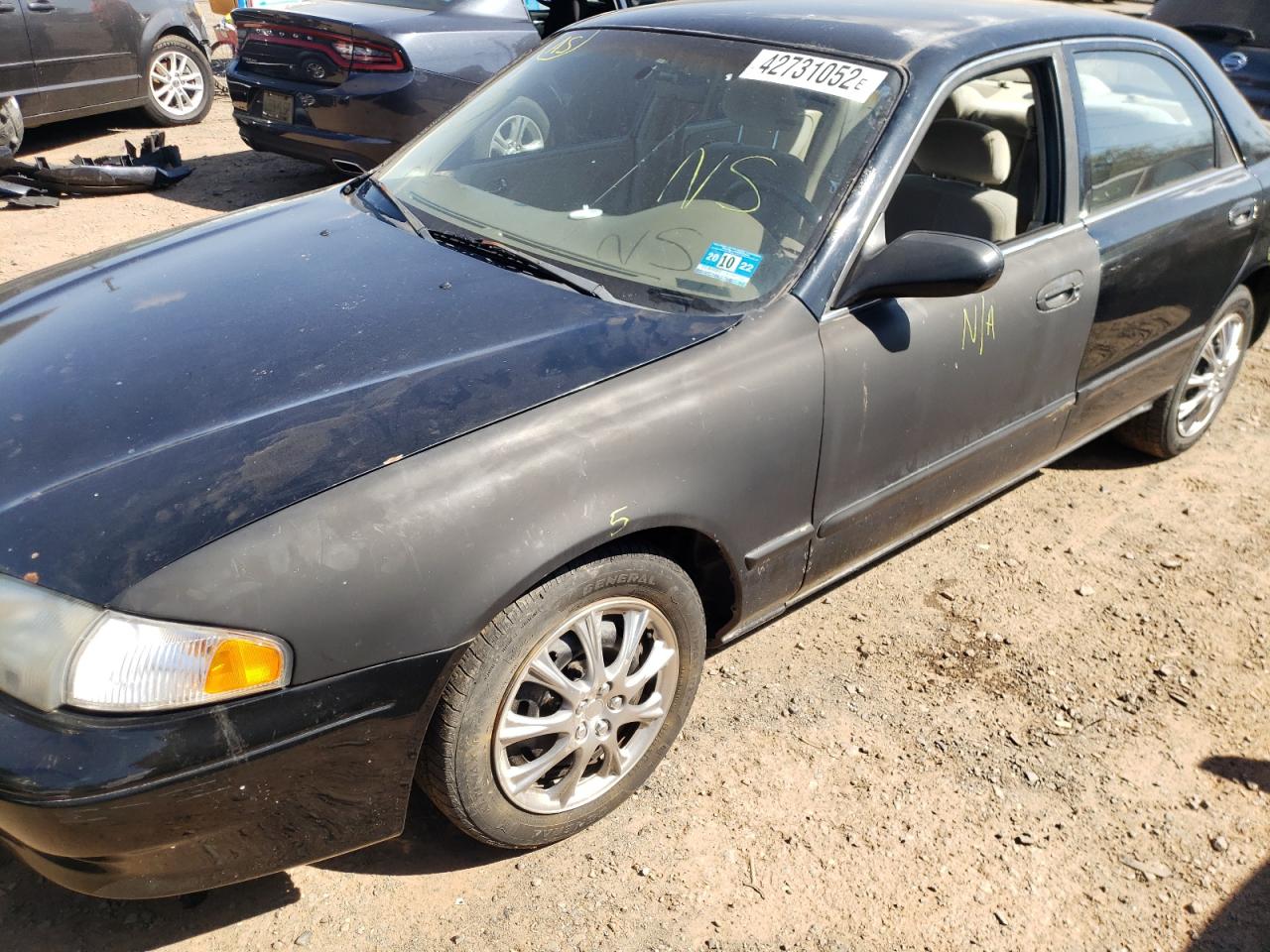 Photo 9 from auction – 2000 MAZDA 626 ES with VIN 1YVGF22C5Y5124192
