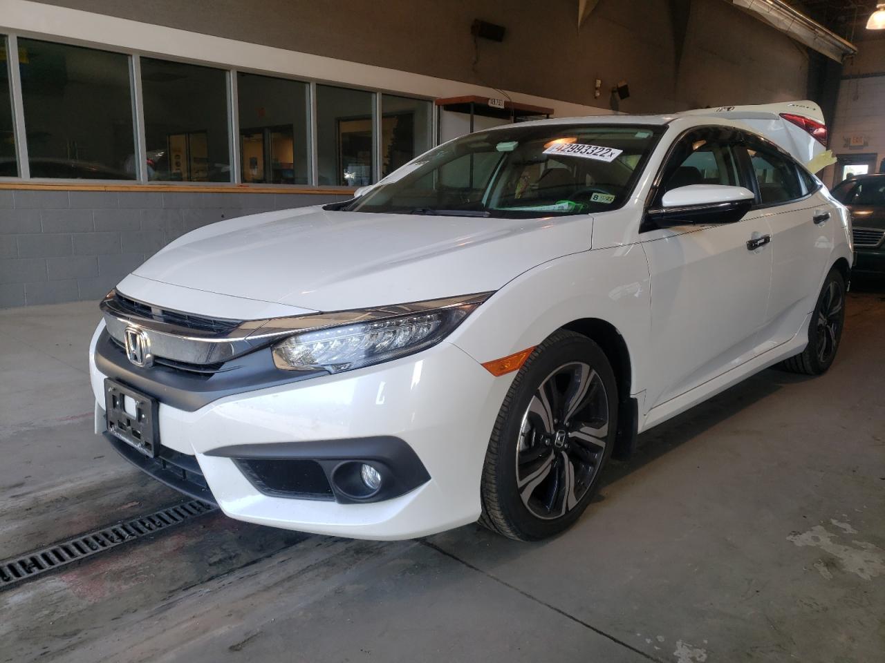 Photo 2 from auction – 2016 HONDA CIVIC TOUR with VIN 19XFC1F98GE030698