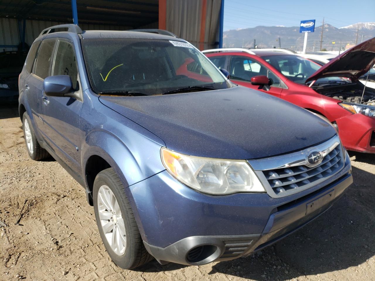 SUBARU FORESTER 2 2011 with VIN JF2SHADC1BH730579 - Photo from auction