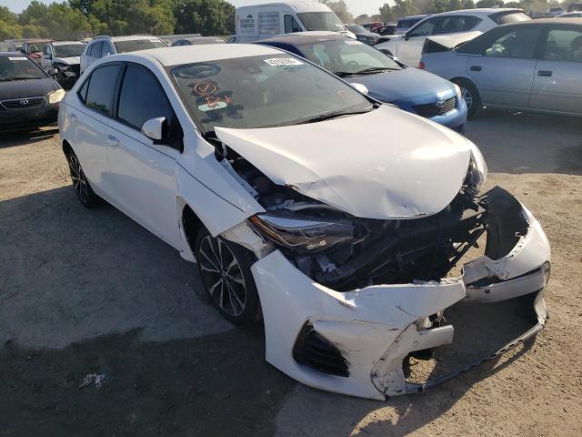 TOYOTA COROLLA L 2018 with VIN 5YFBURHE7JP814168 - Photo from auction