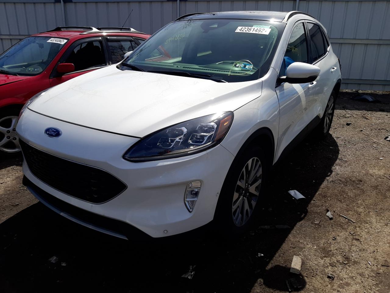 Photo 2 from auction – 2020 FORD ESCAPE TIT with VIN 1FMCU9J97LUA96933