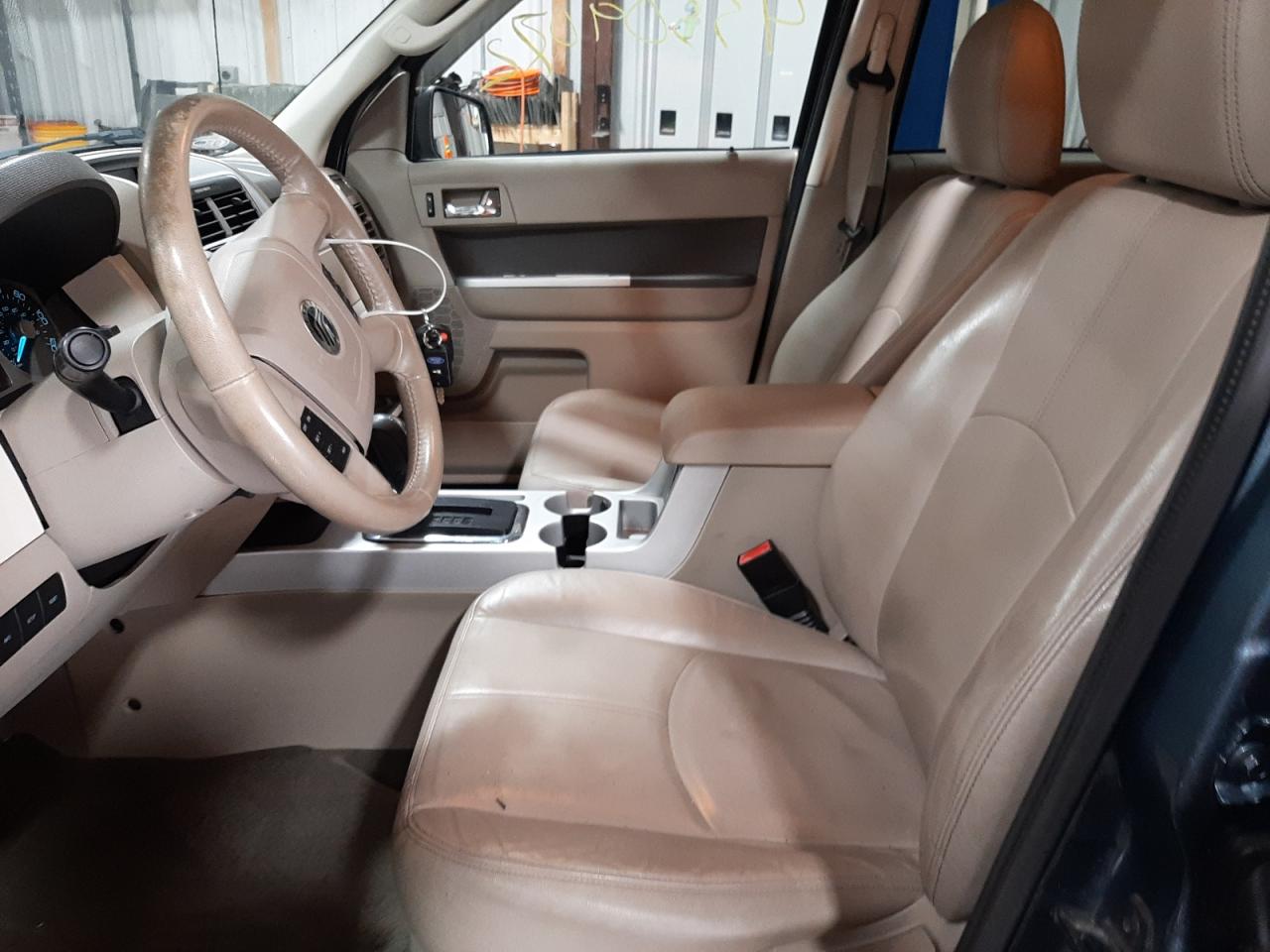 Photo 5 from auction – 2010 MERCURY MARINER with VIN 4M2CN9B73AKJ28844