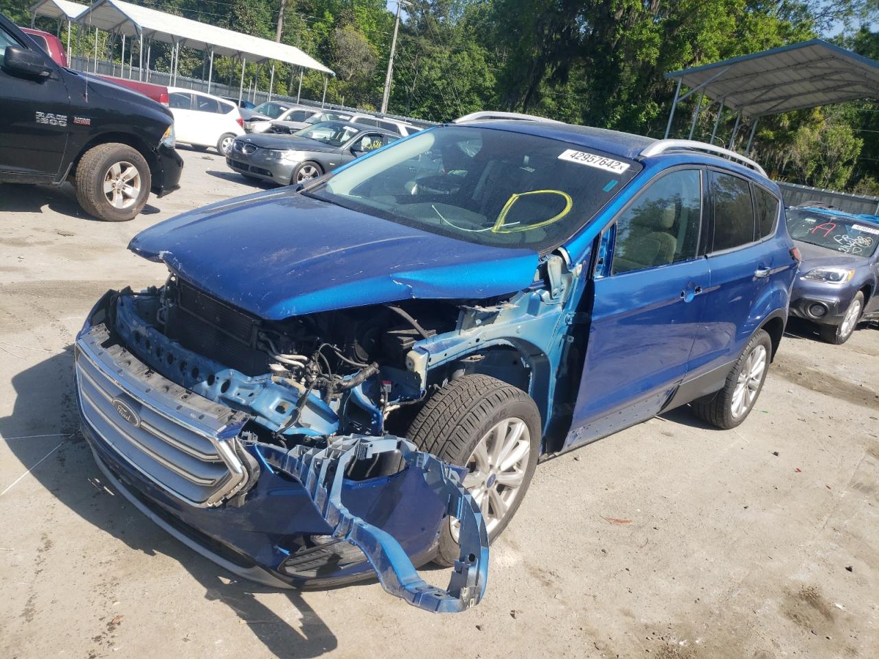 Photo 2 from auction – 2017 FORD ESCAPE TIT with VIN 1FMCU0J98HUC86131