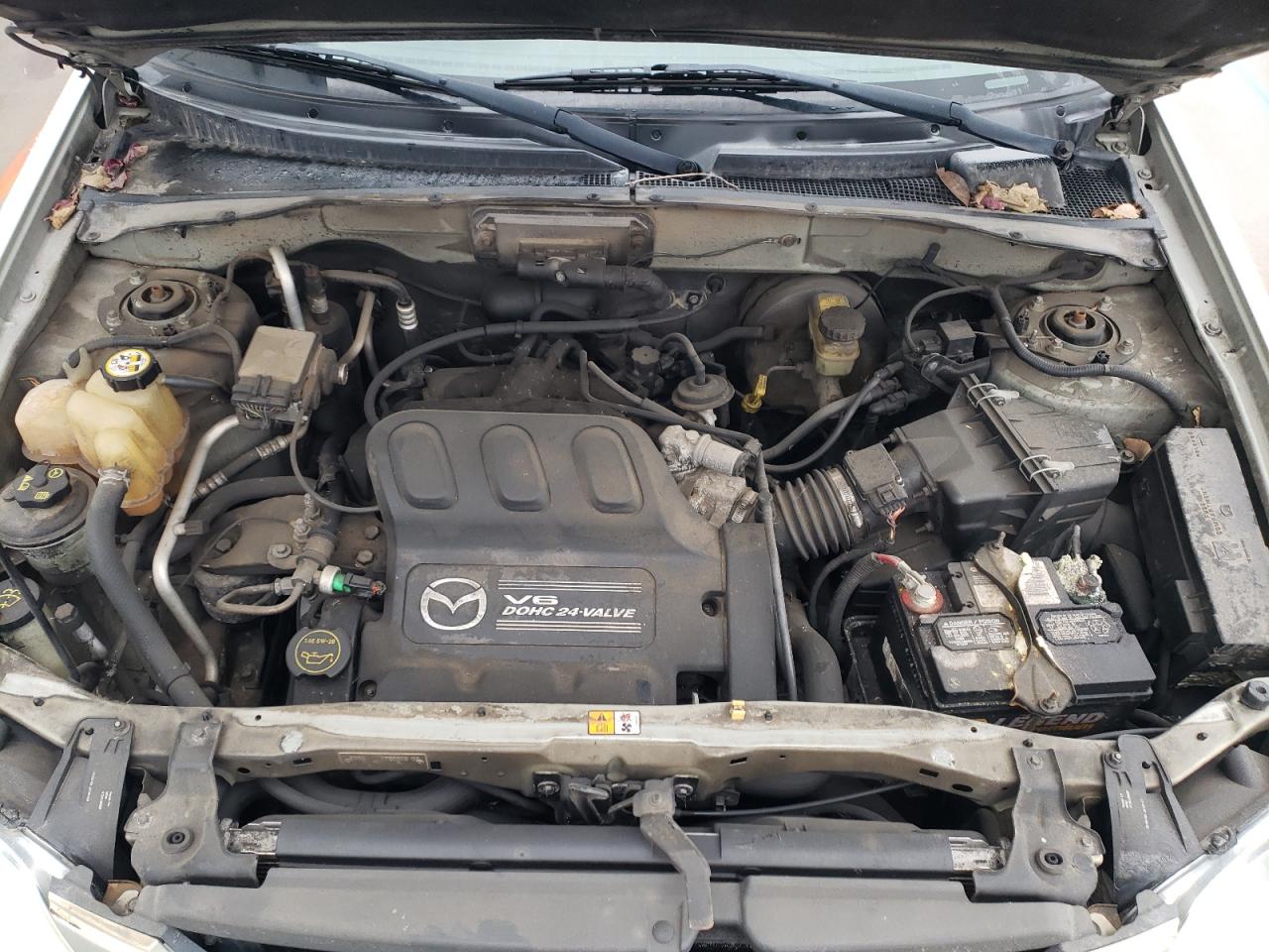 Photo 7 from auction – 2004 MAZDA TRIBUTE LX with VIN 4F2YZ94114KM33904