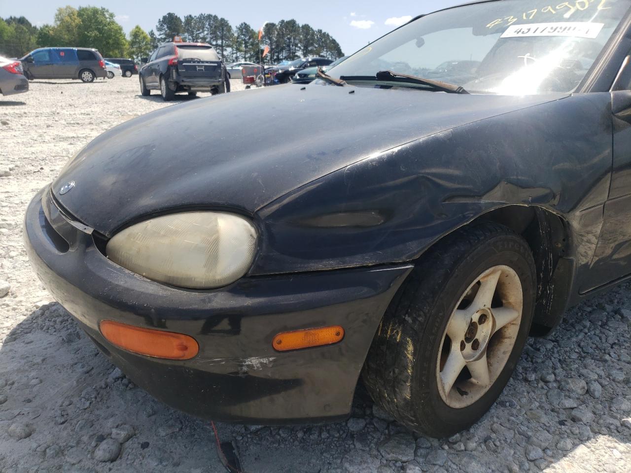 Photo 9 from auction – 1993 MAZDA MX-3 with VIN JM1EC4312P0218279