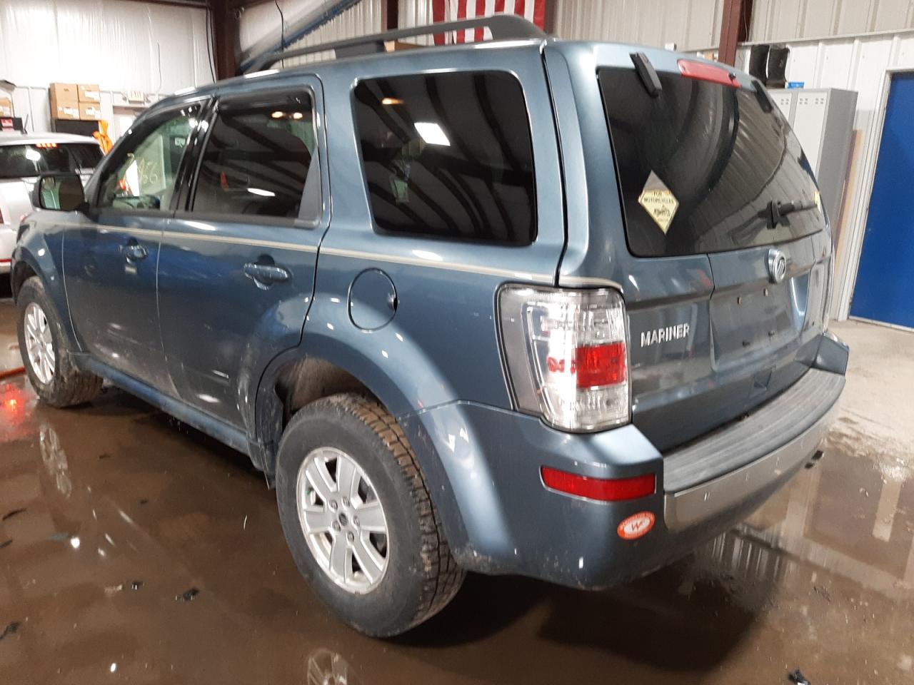 Photo 3 from auction – 2010 MERCURY MARINER with VIN 4M2CN9B73AKJ28844