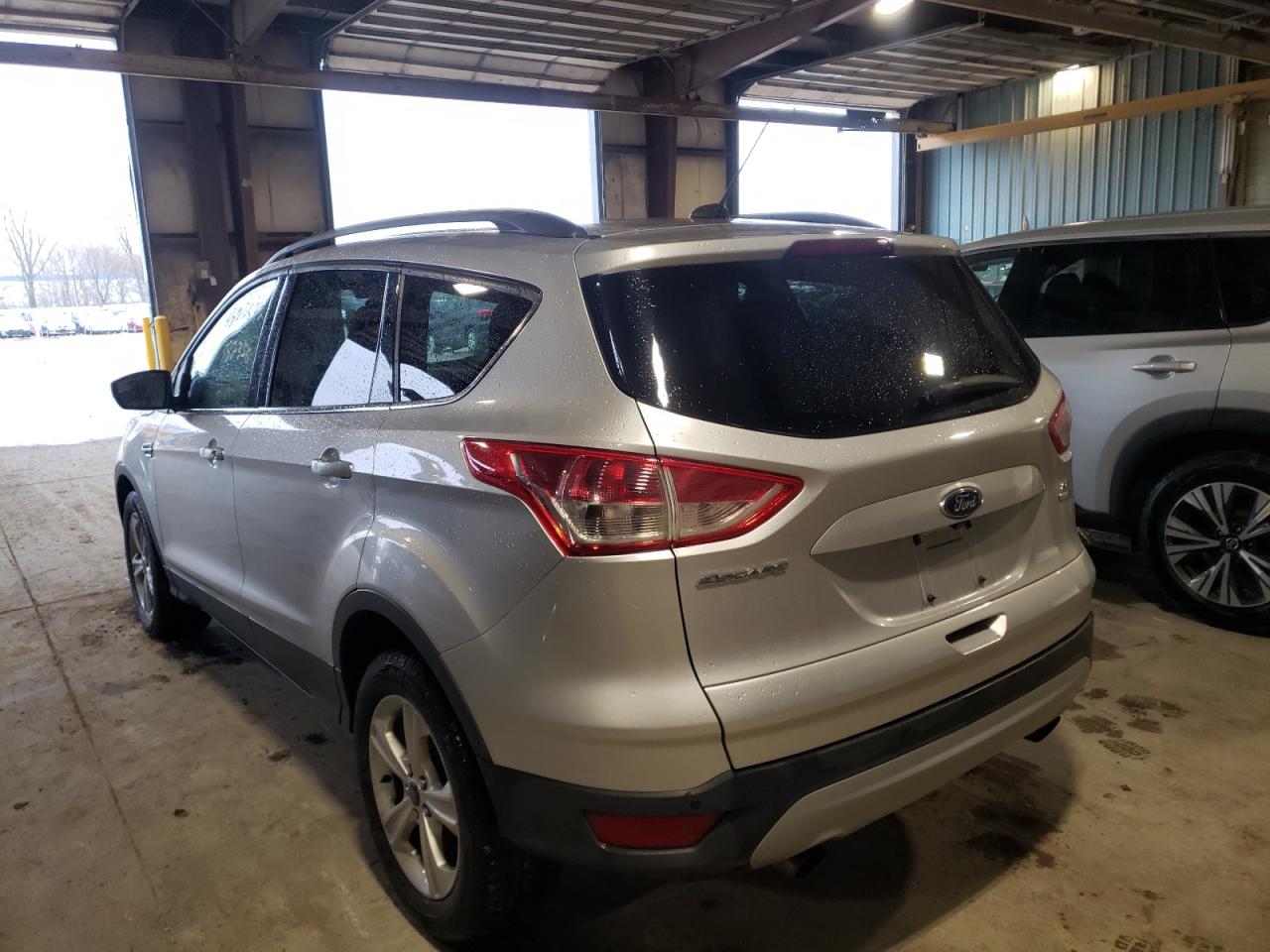 Photo 3 from auction – 2014 FORD ESCAPE SE with VIN 1FMCU9GX0EUC68468