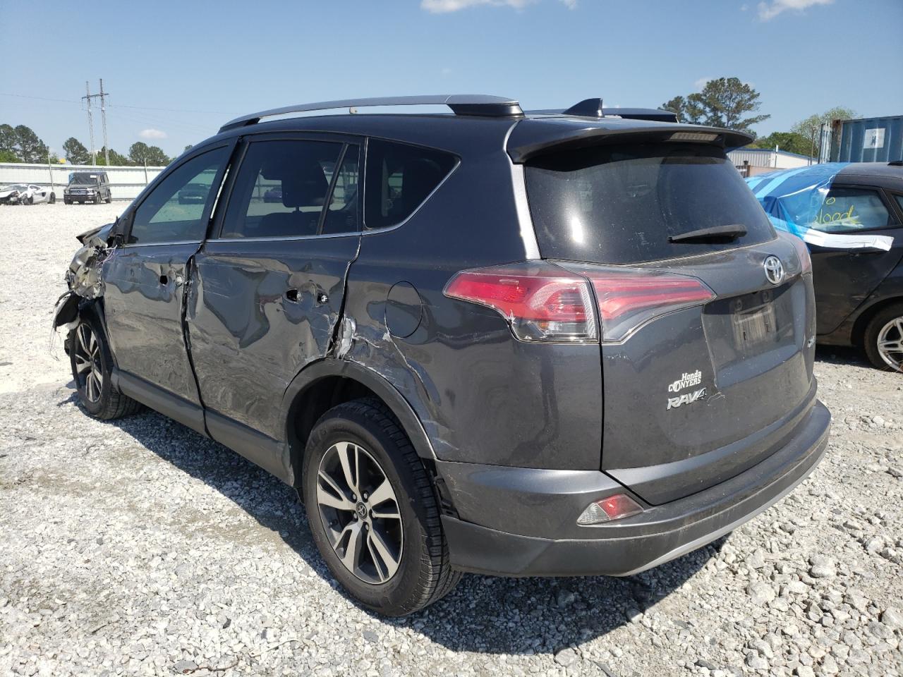 Photo 3 from auction – 2017 TOYOTA RAV4 XLE with VIN JTMWFREV8HD104001