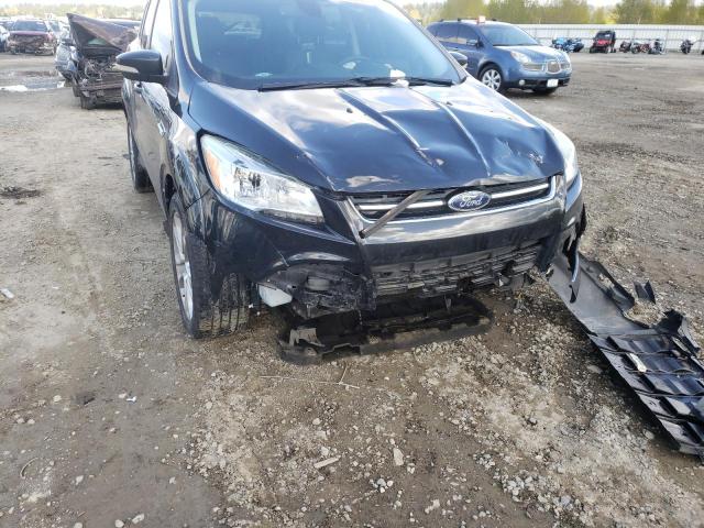Photo 9 from auction – 2015 FORD ESCAPE TIT with VIN 1FMCU0J96FUB05590