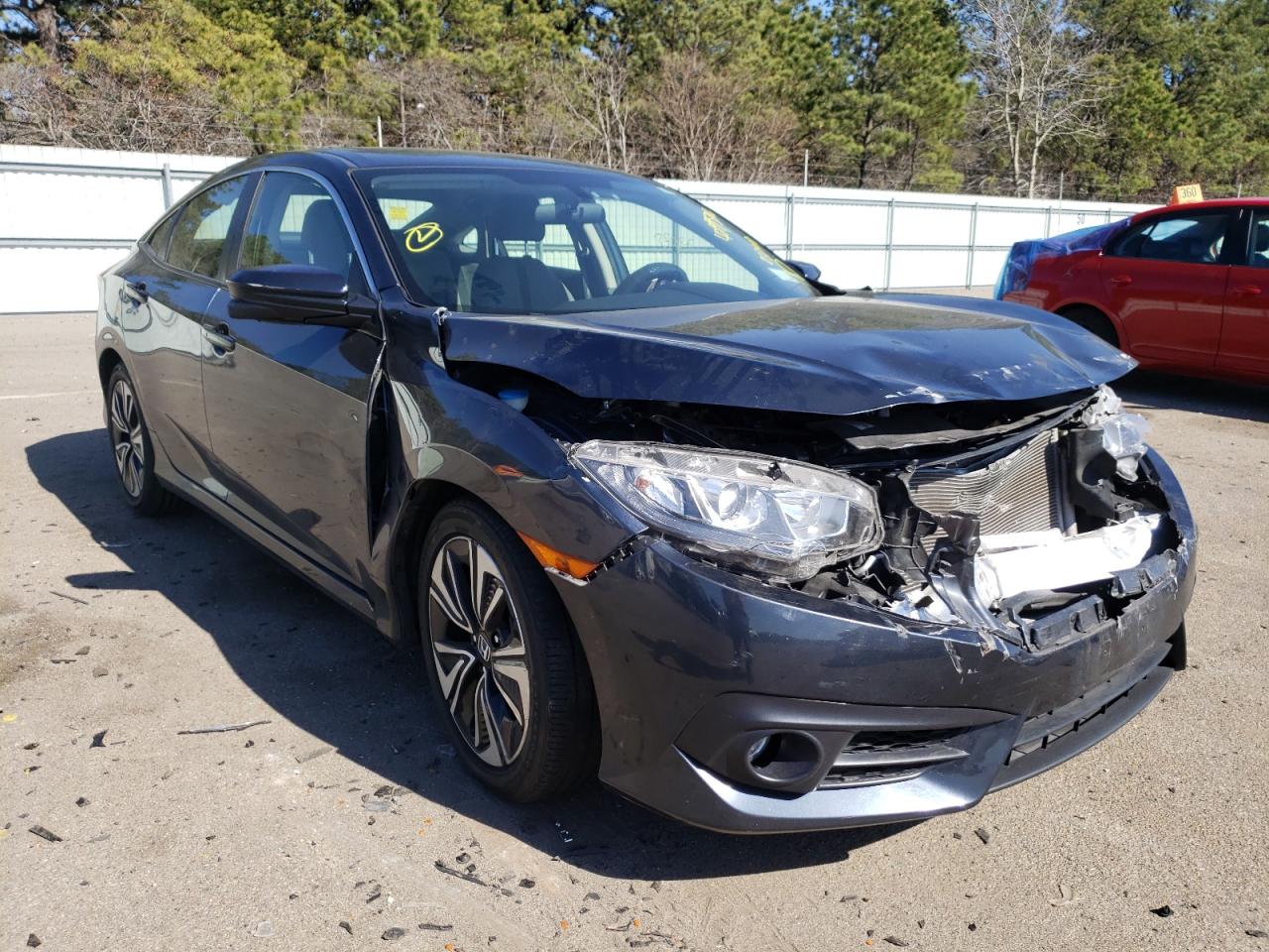HONDA CIVIC EX 2018 with VIN JHMFC1F35JX032412 - Photo from auction