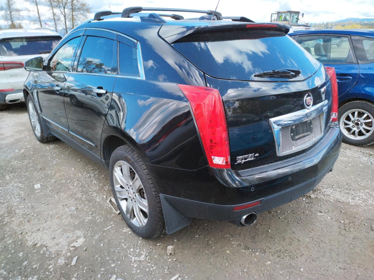 Photo 3 from auction – 2016 CADILLAC SRX PREMIU with VIN 3GYFNDE30GS572673