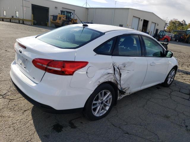 Photo 4 from auction – 2016 FORD FOCUS SE with VIN 1FADP3F24GL322047