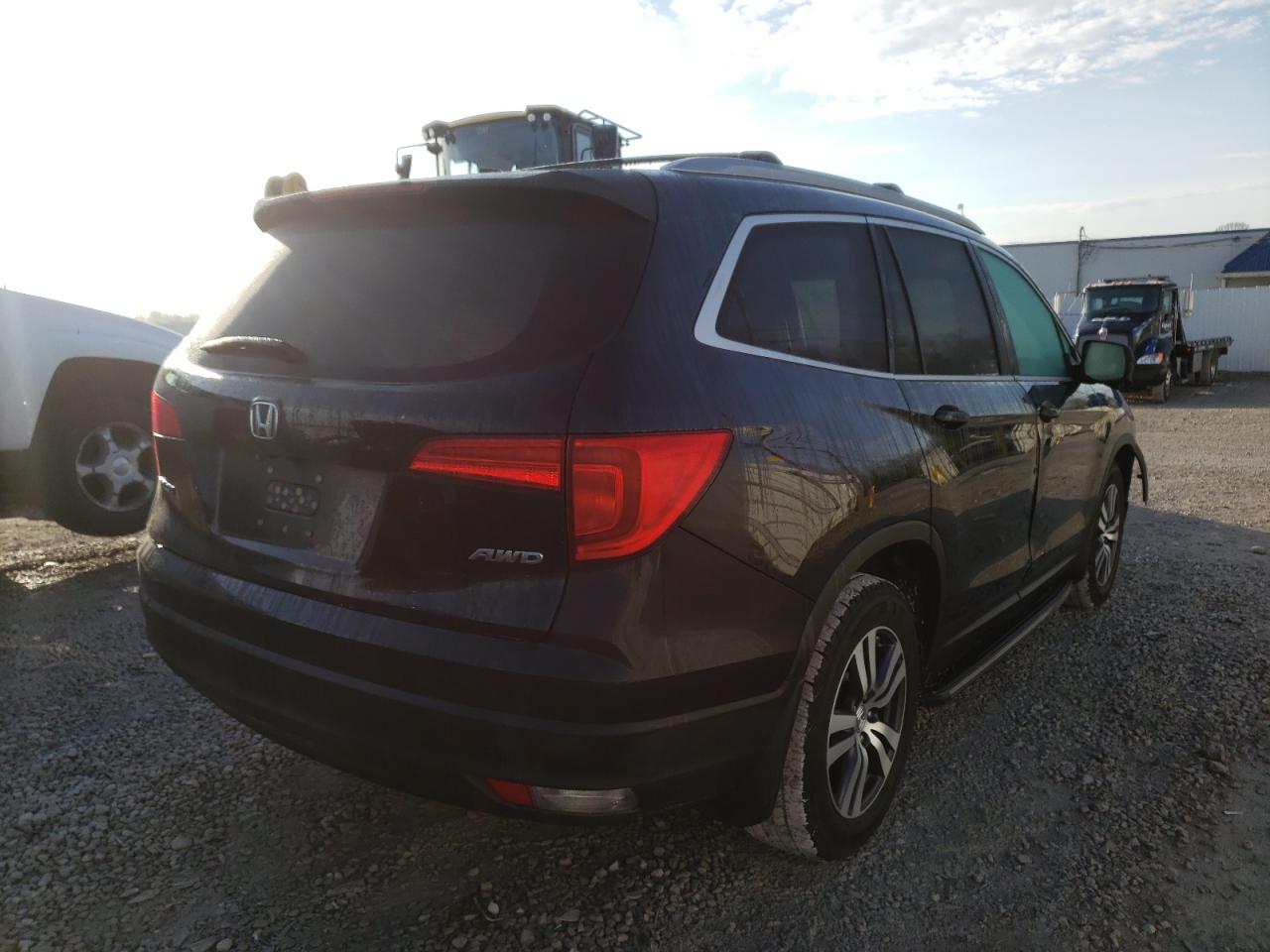 Photo 4 from auction – 2016 HONDA PILOT EXL with VIN 5FNYF6H51GB004963